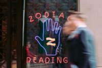 Building With Sign Reading Zodiac Reading