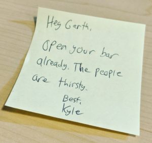 Sticky Note That Says "open your bar already. The people are thirsty"