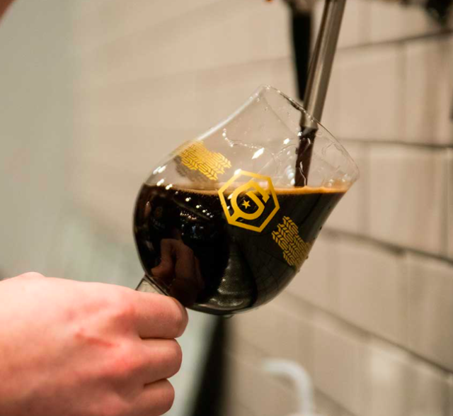Pouring Beer Into A Garth's Brew Bar Glass