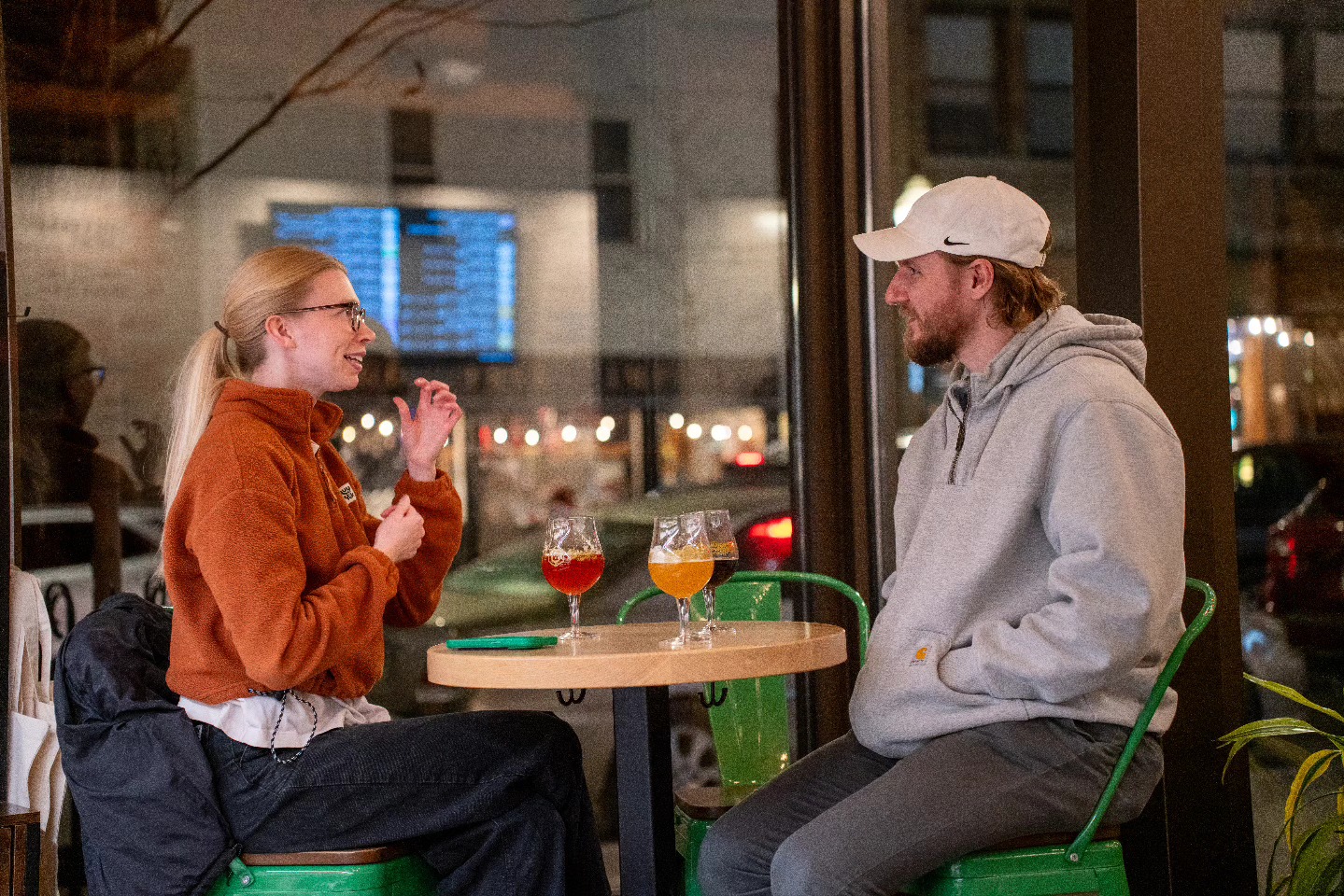 Craft Beer Drinkers Enjoying Seasonal Beers At Garth's Brew Bar